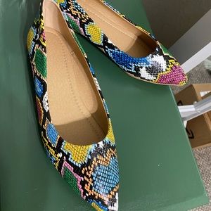 Multicolored imitation snake skin flats, brand new, never worn.